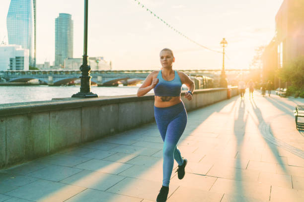 istock Woman jogging in London 1347639171