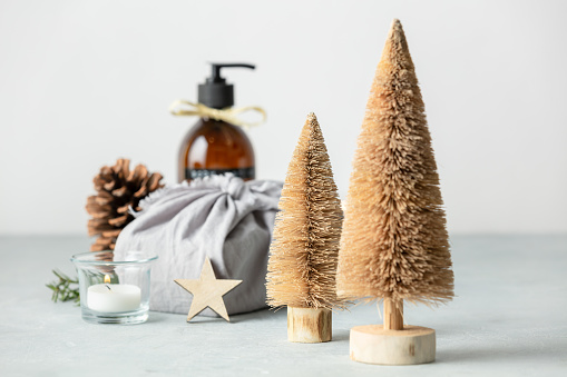 Eco friendly Christmas concept - Miniature Christmas trees made of Coconut fiber,  Fabric wrapped gifts and Christmas decorations
