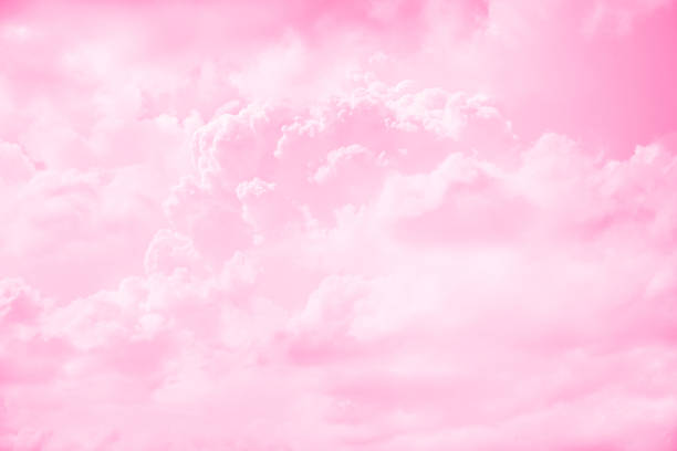 istock Pink sky with white clouds. Abstract background with copy space for design. Valentine day, birthday, wedding, valentine card, holiday. 1347646346