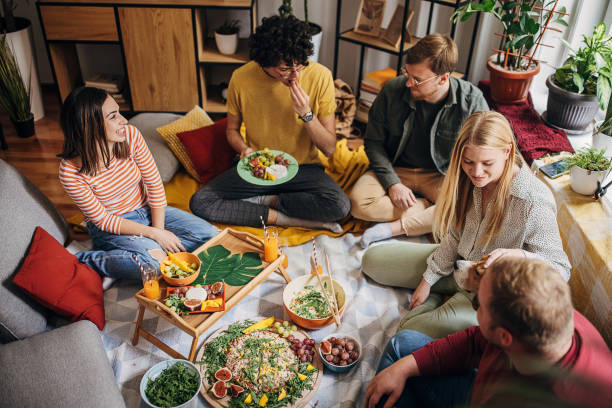 istock Group of friends at home 1347647843