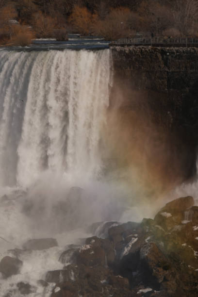 istock Amazing Niagara falls, water stream crashing rocks, raiwbow moist 1347651922