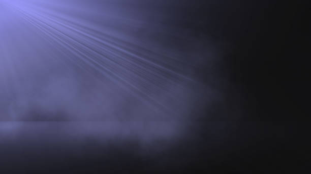 istock 3D display background with rays of light shining into smoky room 1347652316