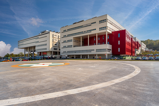 Verduno, Alba, Piedmont, Italy - October 12, 2021: Michele and Pietro Ferrero Hospital seen from the emergency  helipad, ASL CN2 important hospital of Alba, Bra and Langhe