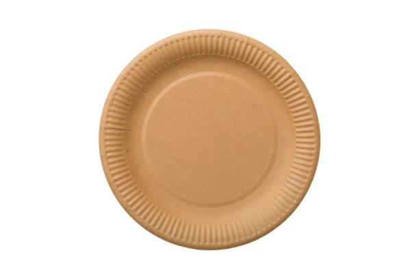 istock Yellow paper round plate isolated over white background. Top view 1347655406