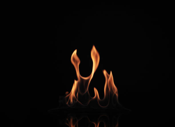 istock Beautiful bright fire flames on black background 1347656033