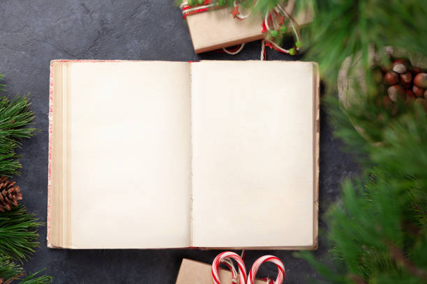 istock Christmas gift box with craft decor and vintage book 1347660128