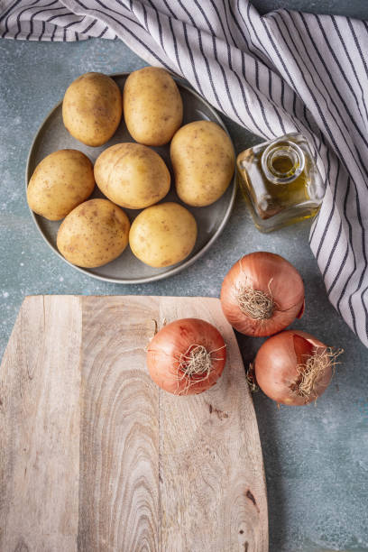 istock potatoes, onions and olive oil 1347662065