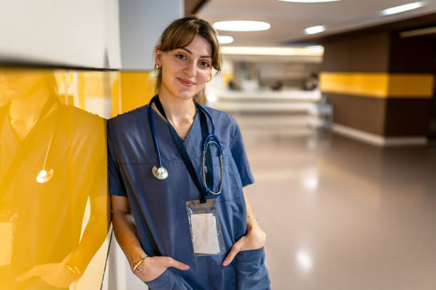 Portrait of young female nurse in hospital stock photo