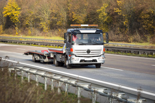 istock Tow truck on a highway 1347664706