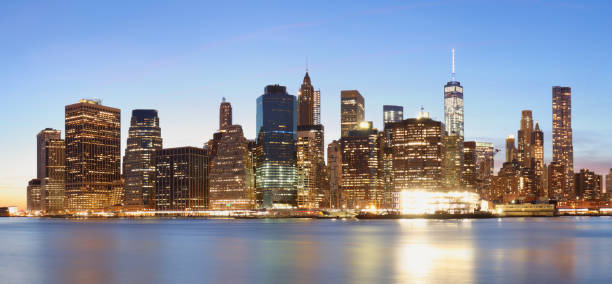 istock New York panorama with Brooklyn bridge at night, USA 1347665063