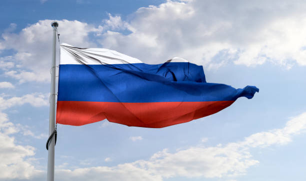 istock Russia flag - realistic waving fabric flag. 1347666351