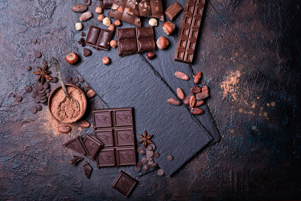 istock Pieces of broken milk and dark chocolate bars 1347666608