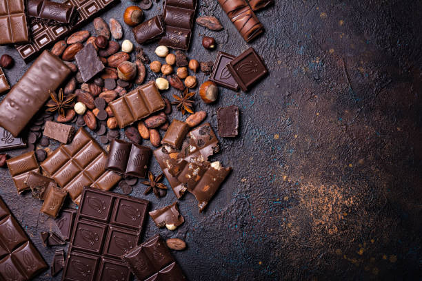 istock Pieces of broken milk and dark chocolate bars 1347666670