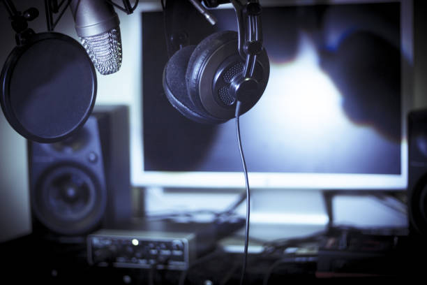 istock Announcer microphone on recording studio background. No people 1347668577