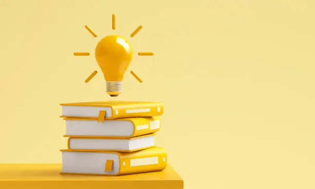 Light bulb over the yellow books on a yellow background. 3d illustration