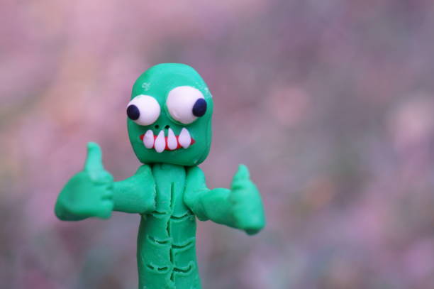 istock Happy zombie with two fingers raised up. The 