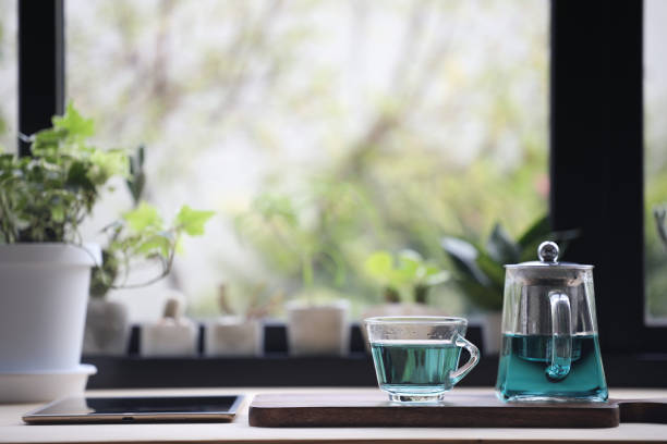 istock Butterfly pea tea juice and tablet on wooden table 1347671807