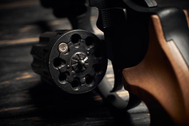 Revolver Cylinder With One Flobert Ammo 4mm On Dark Wooden Background Russian  Roulette Concept Stock Photo - Download Image Now - iStock