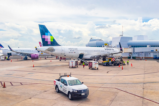 An Air Transat airplane parking at Pearson International Airport - the primary international airport serving Toronto, Golden Horseshoe.