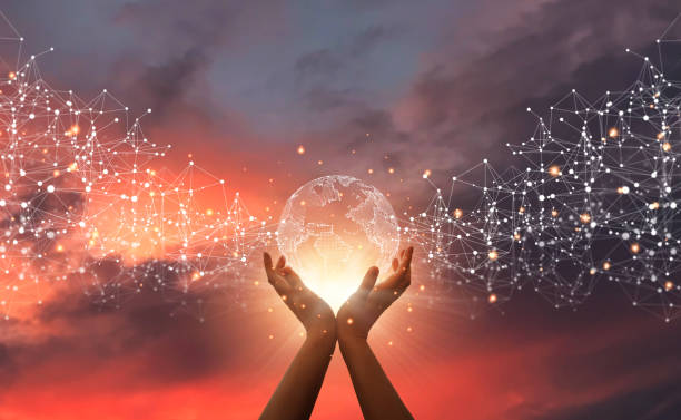 istock Hands holding global network connections and technology innovation in science at sunset. Global network connections.  Communication network Technology. 1347679879