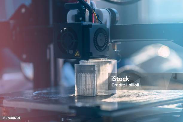 The 3d Printer Prints White Transparent Plastic Model Stock Photo - Download Image Now