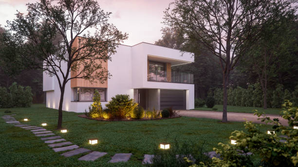 maison moderne de luxe à forest at dawn - suburb house garage facade photos et images de collection