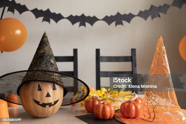 Preparation For Halloween Party At Home Room Is Decorated With Pumpkin Balloons Bats And Candles Holiday Decoration Concept Selective Focus Stock Photo - Download Image Now