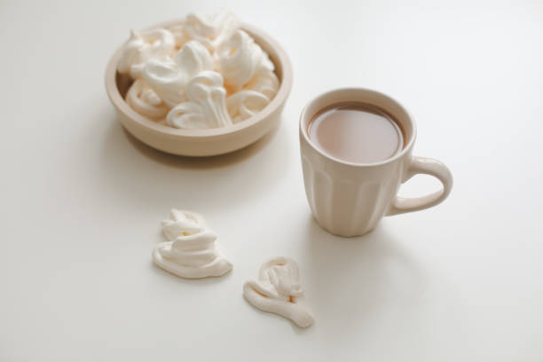 istock breakfast with a cup of coffee on a white table top view, flat lay 1347690070