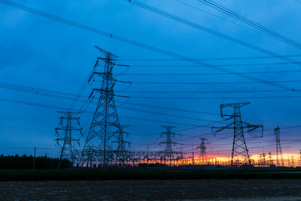 istock Pylons, high voltage pylons in the evening 1347692053