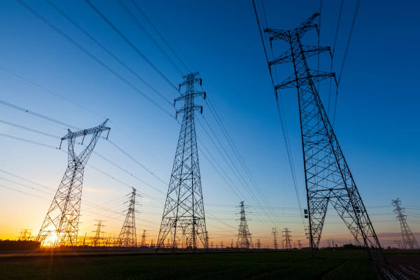 istock Pylons, high voltage pylons in the evening 1347692111