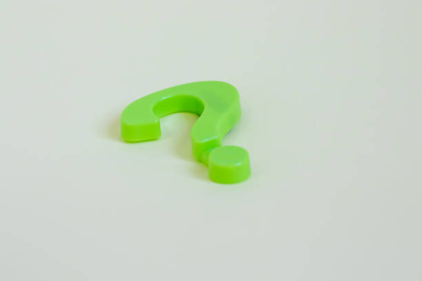 istock Question Mark Fridge Magnet toy, on wood 1347693093