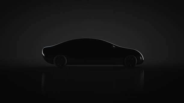 istock Silhouette of a passenger car on a dark background 1347693225