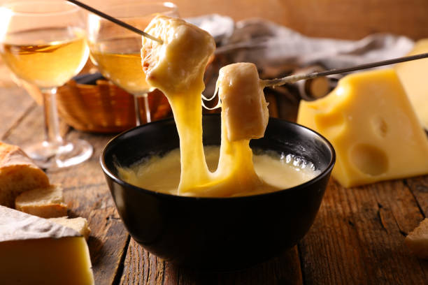 istock cheese fondue with baguette and wine 1347700006
