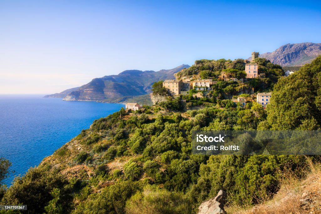 The Steep Hill Leading from the Corsican Village of Nonza to the Sea The steep hill leading from the Corsican village of Nonza to the sea Bastia Stock Photo