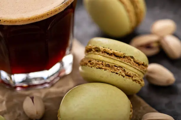 Photo of Pistachio macarons with coffee