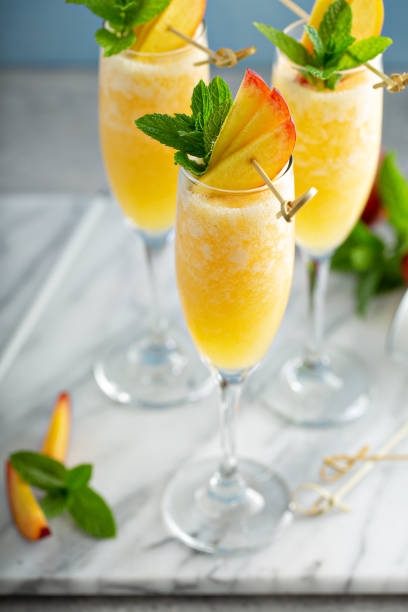 istock Summertime peach mimosas or bellinis 1347703776