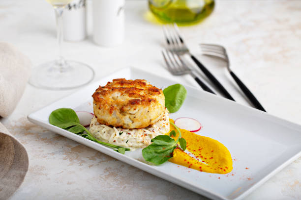 Gourmet plated fishcake with vegetables