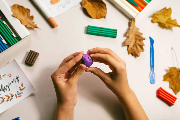 istock Process of making a turkey from plasticine for Thanksgiving. Traditions, holidays concept. 1347704928