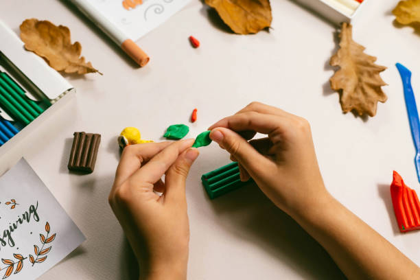 istock Process of making a turkey from plasticine for Thanksgiving. Traditions, holidays concept. 1347704938