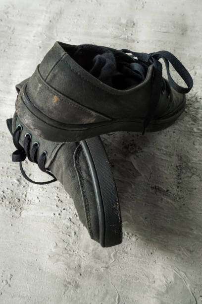 istock Black casual shoes on the floor 1347705262