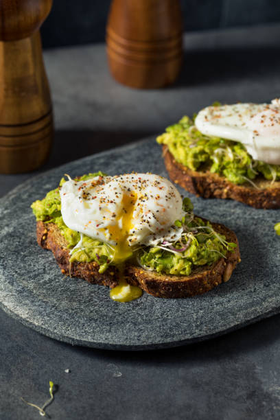 istock Homemade Healthy Avocado Toast with Poached Egg 1347706086