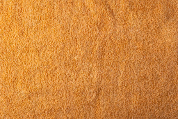 istock texture of orange towel close up, top view 1347712087