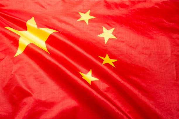 istock China flag waving as a background. 1347712520