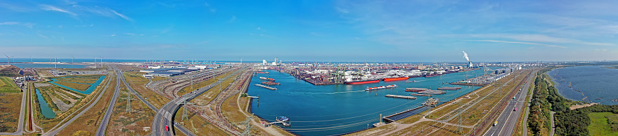 Aerial view of a Large RoRo (Roll on/off) Vehicle carrier cruising the Mediterranean sea.