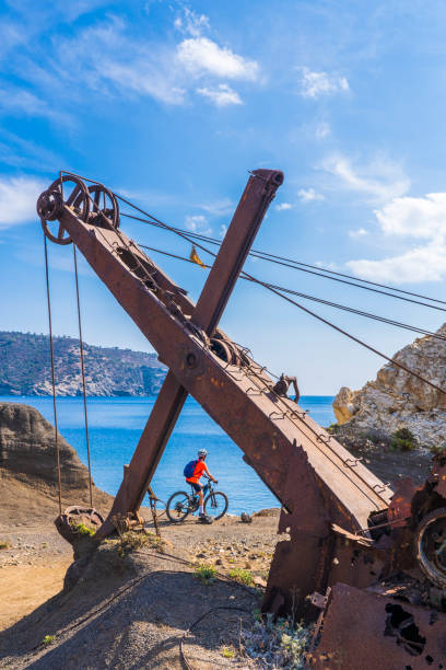 woman on electric mountain bike on elba island, tuscany, italy - 2586 imagens e fotografias de stock