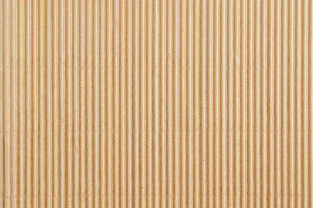 texture de fond fragment de carton ondulé brun. - brown paper paper striped corrugated cardboard photos et images de collection