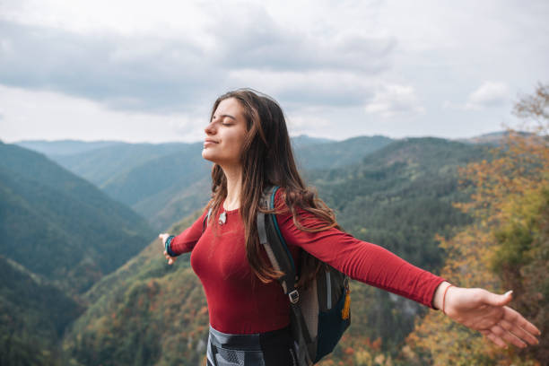 istock Young Woman Enjoying Nature's Freshness 1347721386