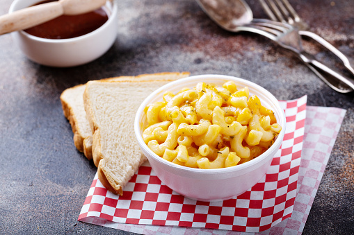 Mac and cheese in a foam bowl, southern barbeque side