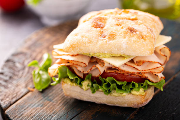 istock Fresh and healthy pesto turkey sandwich 1347729118