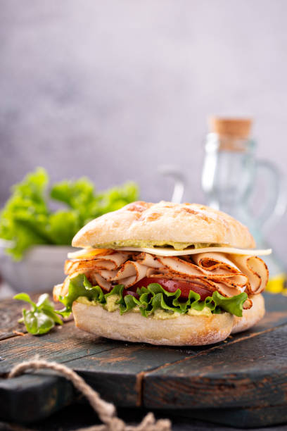 istock Fresh and healthy pesto turkey sandwich 1347729129
